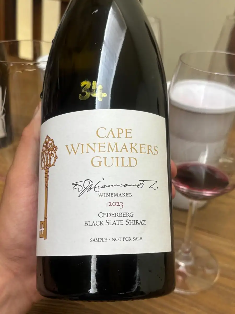 A Cape Winemakers Guild Cederberg Black Slate Shiraz bottle, hand numbered 34
